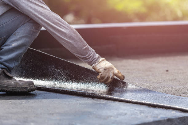 Professional Basement Waterproofing technician working in Lawrenceburg, IN